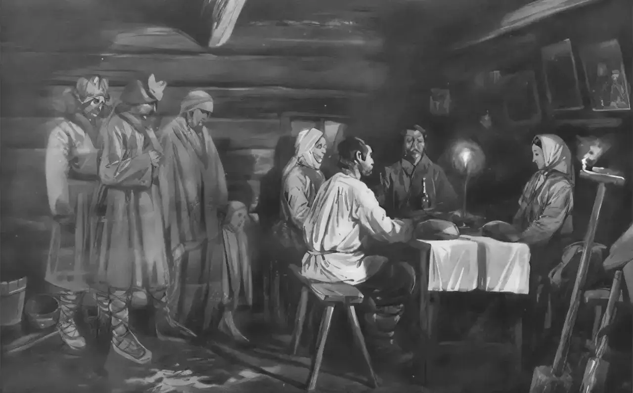 Ludzie w tradycyjnych strojach, w tym dzieci, zebrani w izbie. Na stole świeca, obok narzędzia. Scena przypomina obrzędy dziadów.