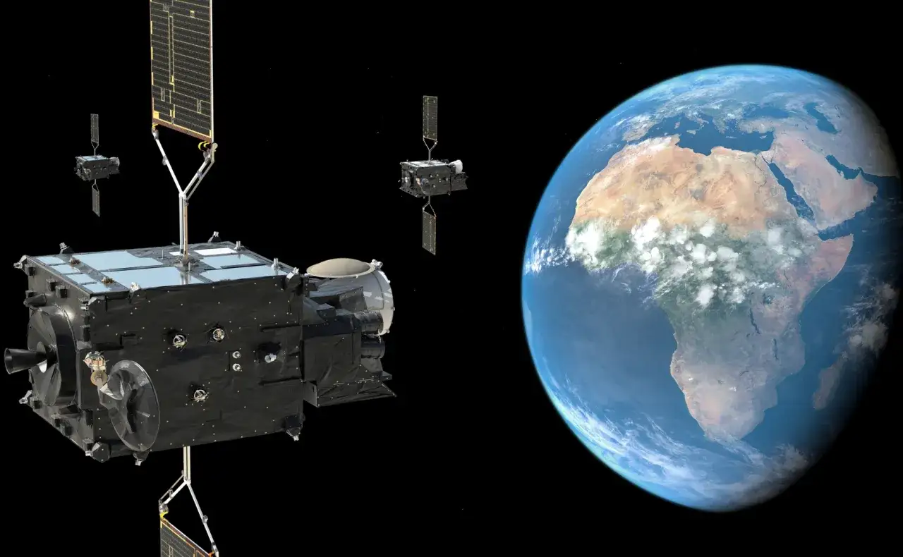 Satelita geostacjonarny w kosmosie, obok Ziemi.